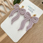 Embossed Bow Earrings (five color options)